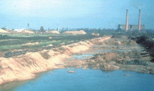 Gravel Extraction, northern pits, 1950s and 1960s Goldington Power Station in the background in operation (Photograph supplied by Nick Hall, Conservation Officer, Bedford Borough Council)